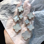 Lumi® Kleeblatt-Ohrringe, weiß, Perlmutt, 4 Motive, silber
