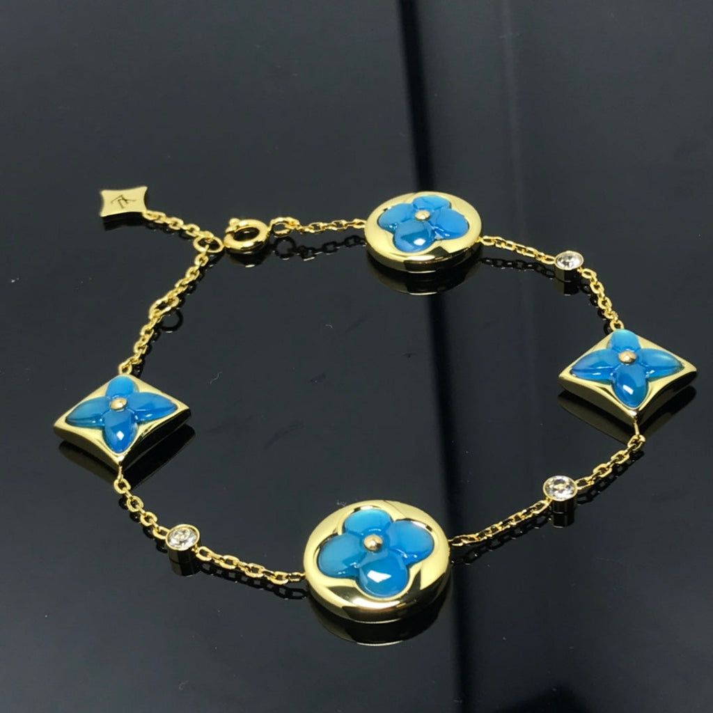 Lumi® Stern und Sonne 4 Motiv Blau Armband