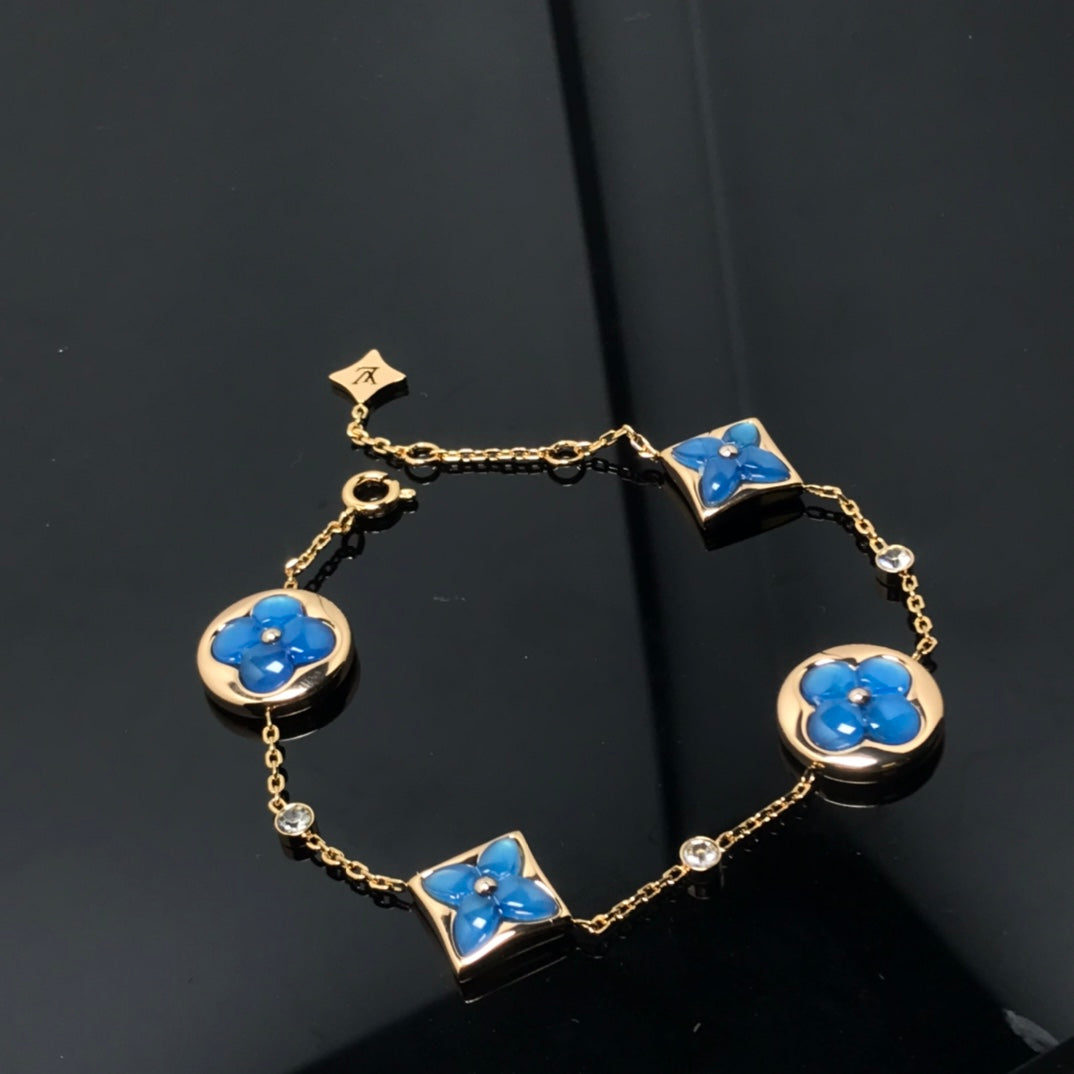 ¡®Lumi¡¯STAR AND SUN 4 MOTIF BLUE BRACELET