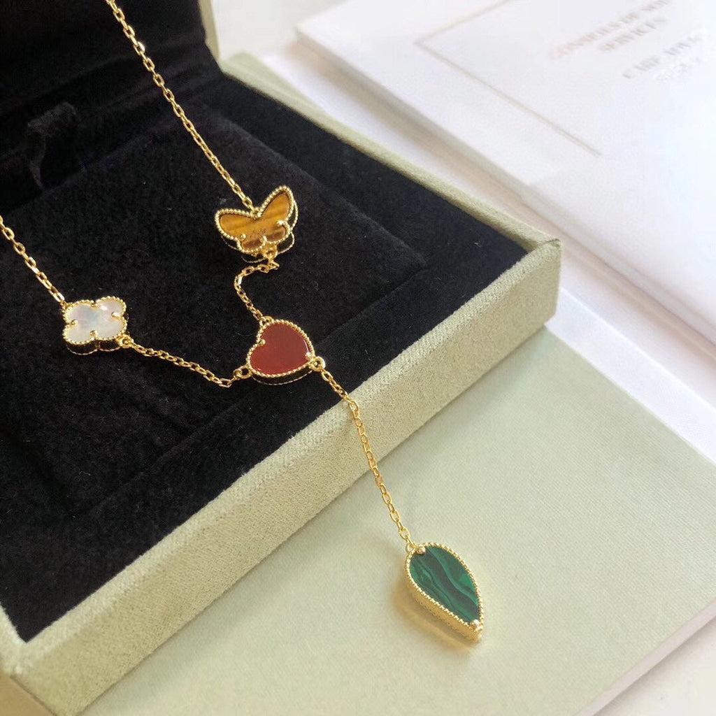 Lumi® Glücksfrühling Halskette mit 4 Motiven in Roségold